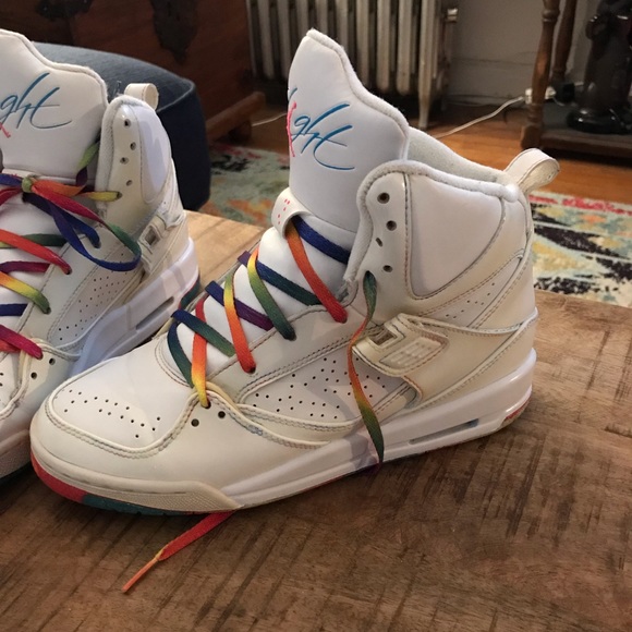 white jordans with rainbow bottom